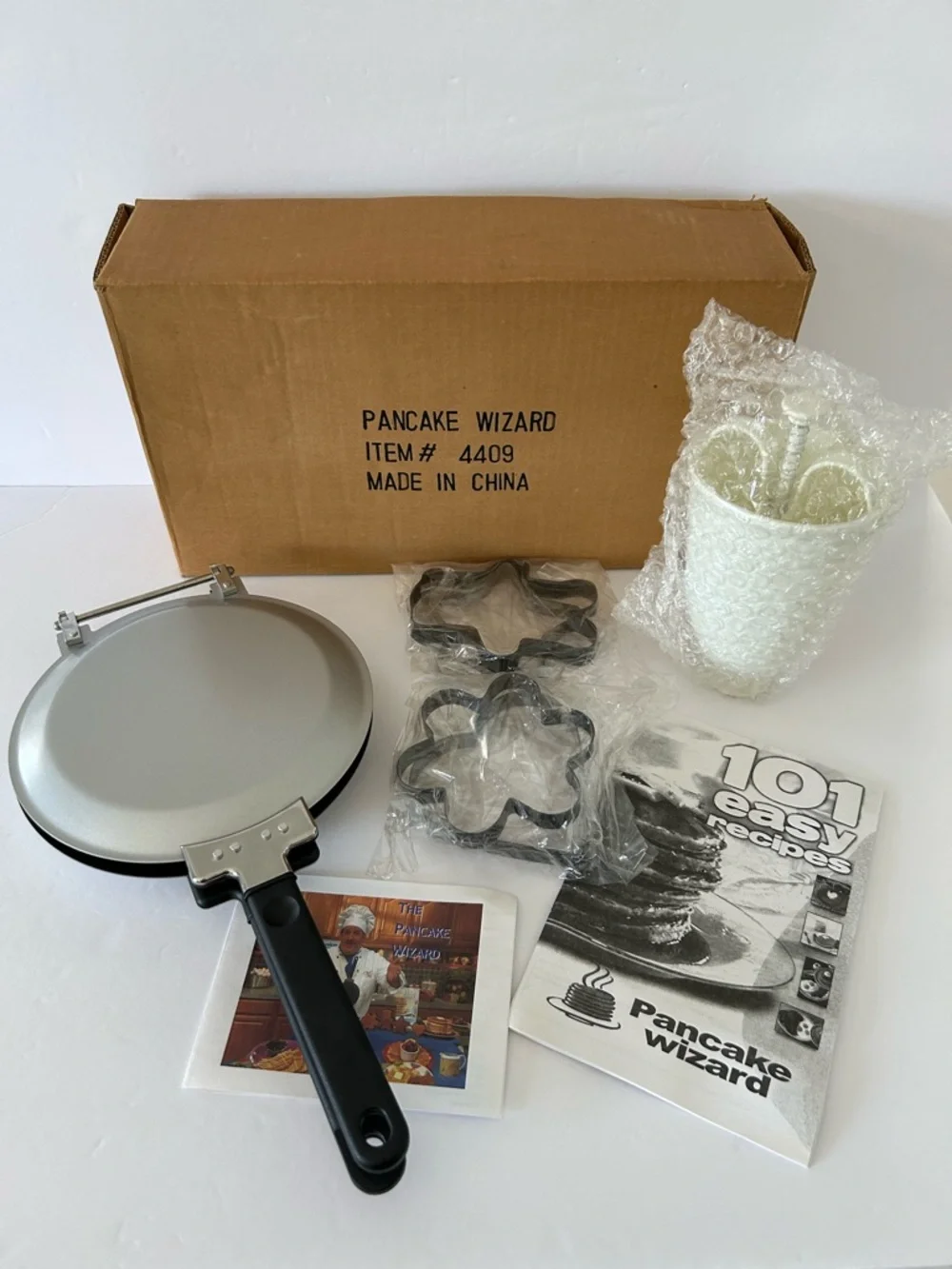 VTG “Pancake Wizard” Set includes: Pan, Batter Dispenser, Booklet, and 4 Shapes
